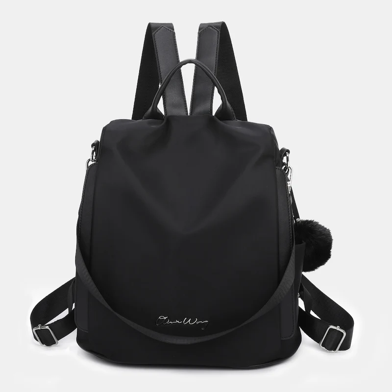 Mochila antirrobo Impermeable para mujer (14.80L) | Mochila Convertible en bolso con pompón y asa desmontable de adorno Negro