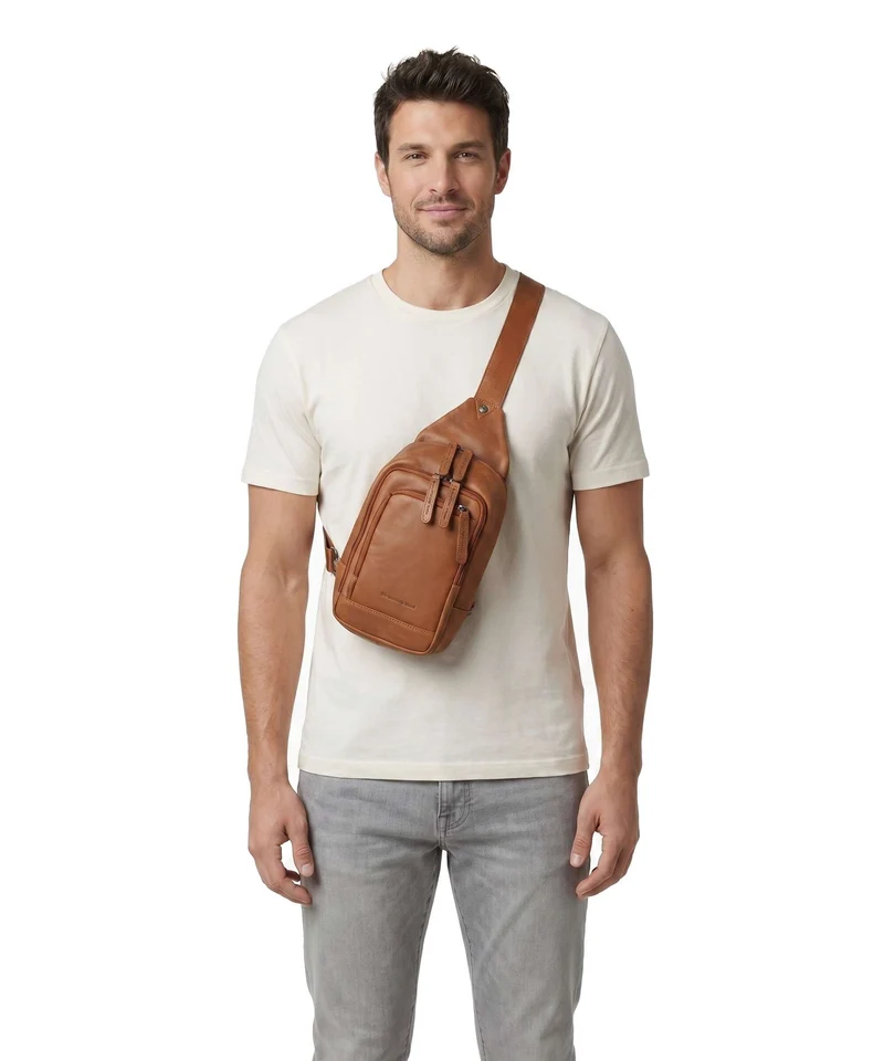 The Chesterfield Brand Wax Pull Up Cow Riga Mochila sling cognac