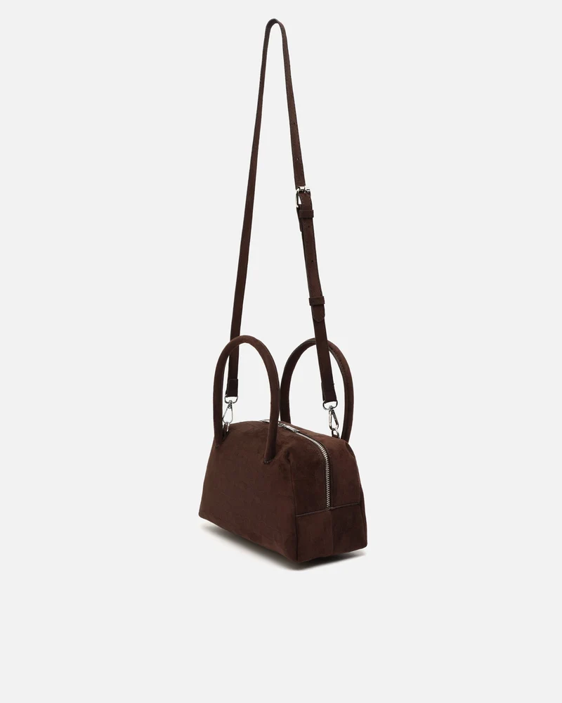 Croquito bolso de mano efecto ante con grabado animal print y asa bandolera extraíble
