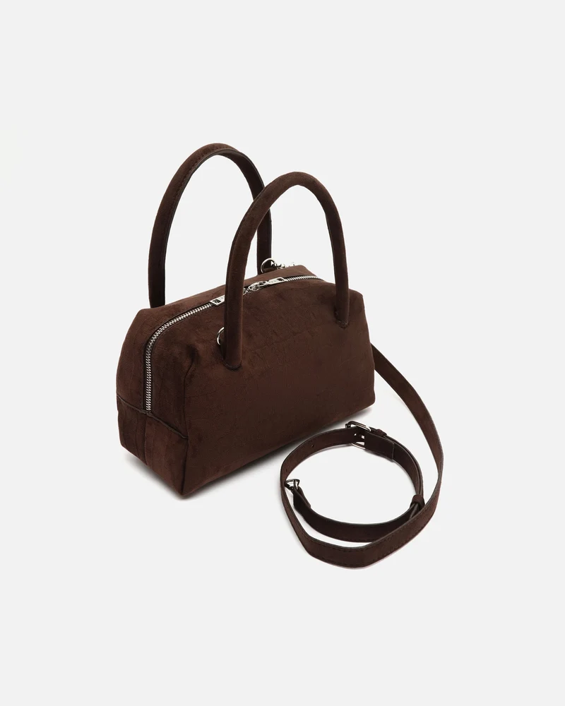 Croquito bolso de mano efecto ante con grabado animal print y asa bandolera extraíble