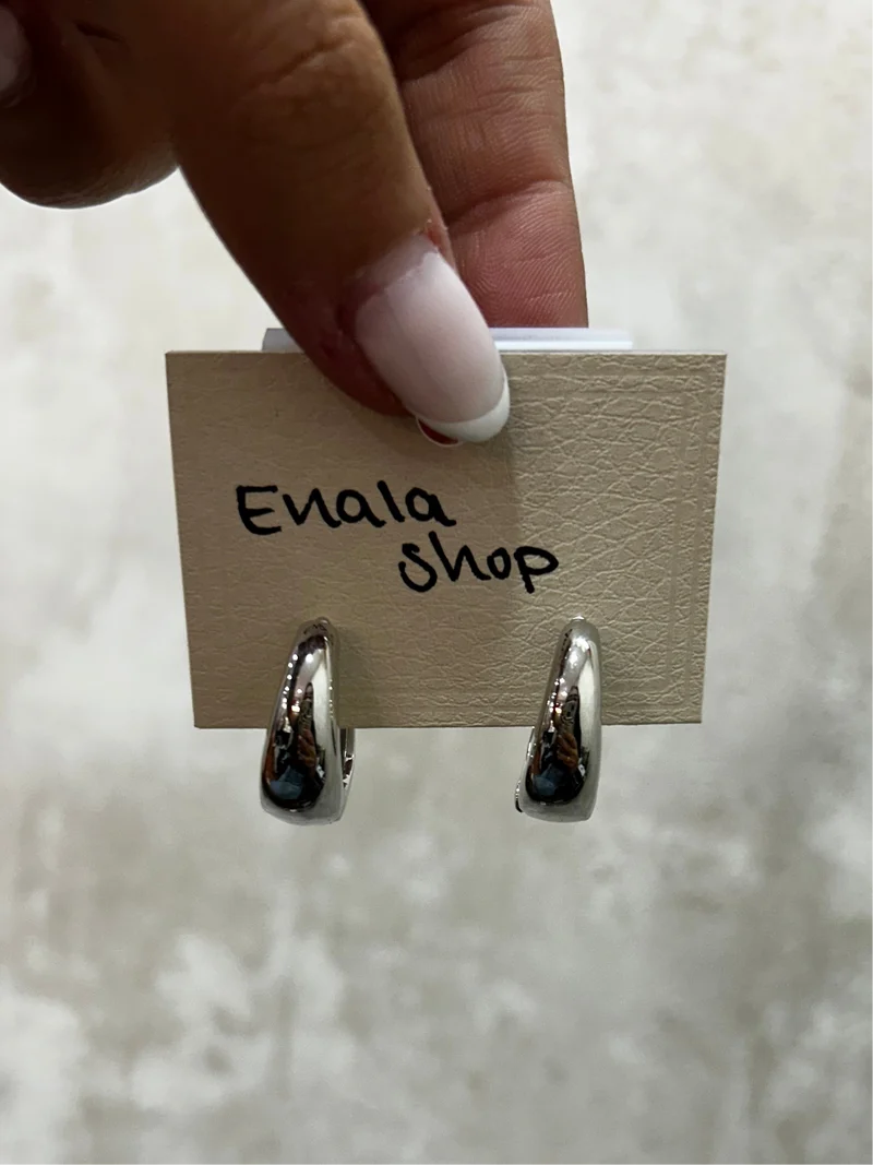 Pendientes arilla acero